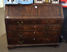 18th century walnut and mahogany large bureau, fall front and fitted interior over two short and