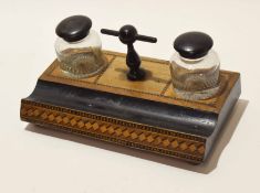 Late 19th century small ink stand fitted with two inkwells and pen tray and central carry handle,