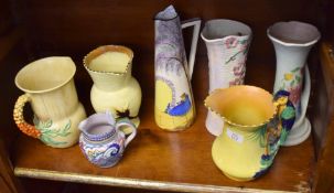 Group of Art Deco pottery including a Poole jug with a geometric design, a Burleigh ware jug with