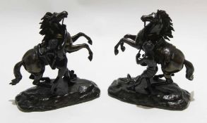 Two spelter figures of warriors and horses on shaped bases, 19cm long (2)