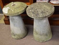 Two cement staddle stones of typical mushroom shape with lift off tops, each 48cm diam x 70cm high