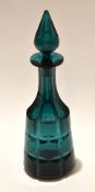 Faceted green glass decanter and tear drop shape stopper, 37cm high