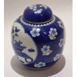 19th century Chinese blue and white ginger jar and cover decorated in Kangxi style with two panels