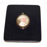 Late 18th century English School portrait miniature, Head and shoulders portrait of a gent wearing