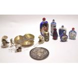 Group of Chinese glass snuff bottles, together with small silver tray, three silver rickshaws and