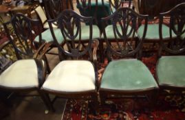 Set of 14 Hepplewhite style mahogany dining chairs, the arched splats each decorated with Prince
