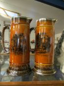PAIR OF RIDGWAYS TREACLE GLAZED JUGS WITH DECORATION FROM MR PICKWICK, WITHIN SILVER COLOURED