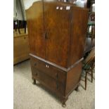 20TH CENTURY WALNUT TALLBOY WITH TWO CUPBOARD DOORS OVER TWO FULL WIDTH DRAWERS RAISED ON PAD FEET