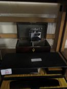 BOX CONTAINING AN EBONY DRESSING TABLE SET TOGETHER WITH A FURTHER 19TH CENTURY INLAID TABLE TOP