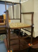 EDWARDIAN MAHOGANY AND INLAID ARMCHAIR WITH UPHOLSTERED SEAT ON TAPERING SQUARE SPADE FEET