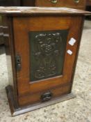 MAHOGANY FRAMED ARTS & CRAFTS SMOKER’S CABINET WITH LIFT UP TOP AND SINGLE PRESSED METAL DOOR WITH