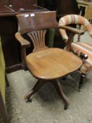 EARLY 20TH CENTURY OAK FRAMED OFFICE CHAIR WITH OPEN SPLAT BACK ON A QUATREFOIL BASE