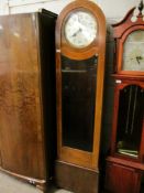 GOOD QUALITY TEAK LONGCASE CLOCK WITH GLAZED DOOR WITH CIRCULAR SILVERED DIAL