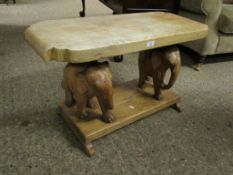 EASTERN HARDWOOD CARVED TABLE WITH TWO ELEPHANT FORMED SUPPORTS