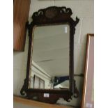 GEORGIAN MAHOGANY FRETWORK CARVED WALL MIRROR WITH GILT INSET SHELL AND GILT SLIP