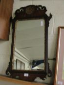 GEORGIAN MAHOGANY FRETWORK CARVED WALL MIRROR WITH GILT INSET SHELL AND GILT SLIP