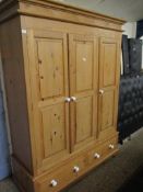 WAXED PINE TRIPLE DOOR WARDROBE WITH TWO DRAWERS TO BASE WITH PORCELAIN KNOB HANDLES