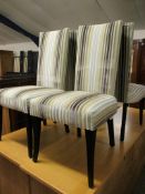 FOUR STRIPED UPHOLSTERED L-SHAPED DINING CHAIRS WITH EBONISED LEGS