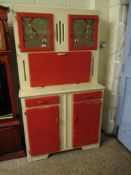 1960S PAINTED KITCHEN CUPBOARD WITH TWO ETCHED DOORS WITH WINDMILL SCENES, WITH DROP FRONT, WITH TWO