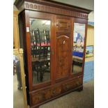 EDWARDIAN WALNUT WARDROBE WITH TWO MIRRORED DOORS WITH TWO DRAWER BASE WITH PANELLED DETAIL