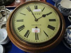 OAK FRAMED CIRCULAR DIAL CLOCK DIXONS OF NORWICH