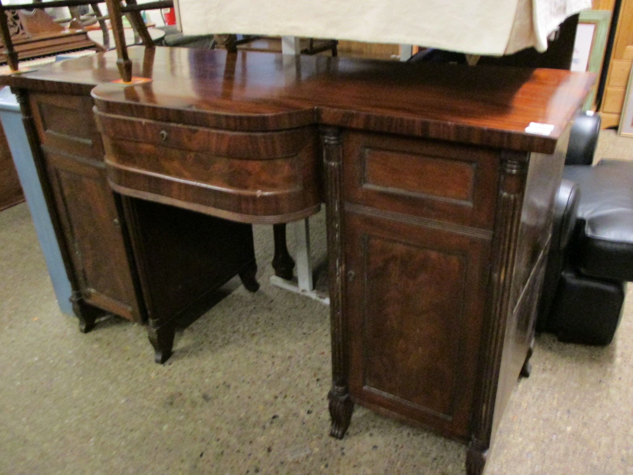 REGENCY MAHOGANY TWIN PEDESTAL SIDEBOARD FITTED CENTRALLY WITH SHAPED DRAWER FLANKED EITHER SIDE