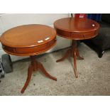 PAIR OF TEAK FRAMED CIRCULAR TABLES WITH BUILT IN DRAWERS AND TRIPOD BASES