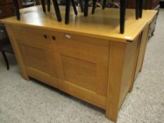 MODERN OAK SIDEBOARD WITH TWO PANELLED CUPBOARD DOORS