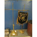 PAIR OF BRASS FRAMED TABLE SCREENS WITH ONE EMBROIDERED PANEL