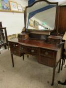 EDWARDIAN MAHOGANY DRESSING TABLE WITH SHAPED MIRRORED BACK WITH TWO DRAWERS AND OPEN SHELF WITH