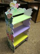 PAINTED CHILDS BOOKSHELF WITH CARVED SIDES AND PAINTED FAIRY BACK