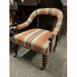19TH CENTURY HORSESHOE BACK ARMCHAIR WITH STRIPED UPHOLSTERY WITH TWISTED FRONT LEGS AND BACK