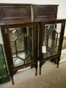 PAIR OF EDWARDIAN MAHOGANY ASTRAGAL GLAZED CABINETS WITH MIRRORED BACKS ON TURNED LEGS