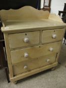 PINE FRAMED CHEST WITH GALLERIED BACK WITH TWO DRAWERS OVER TWO FULL WIDTH DRAWERS ON TURNED KNOB