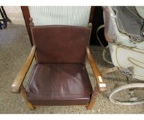 OAK FRAMED CHILD'S ARMCHAIR WITH BROWN REXINE UPHOLSTERED SEAT AND BACK