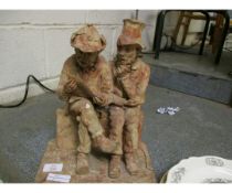 TERRACOTTA MODEL OF TWO GENTS SITTING ON A WALL