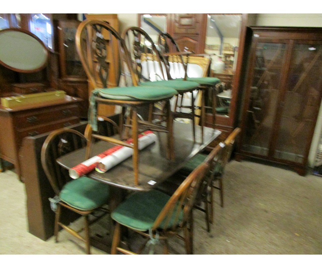 ERCOL RECTANGULAR DINING TABLE TOGETHER WITH A SET OF NINE ERCOL HARD SEATED DINING CHAIRS WITH