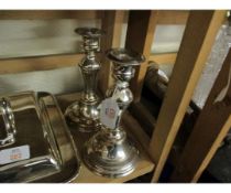 TWO MODERN SILVER ON COPPER SINGLE CANDLESTICKS, EACH WITH DETACHABLE NOZZLES AND URN SHAPED SCONCES