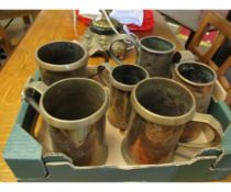 BOX CONTAINING BRASS TANKARDS OR MEASURES