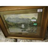 GILT FRAMED WATERCOLOUR OF A BOAT ON A RIVER