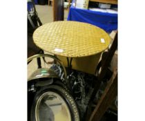 PAIR OF WICKER CIRCULAR TOP SIDE TABLES WITH METAL BASES