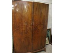 GOOD QUALITY LARGE WALNUT BOW FRONTED DOUBLE DOOR WARDROBE RAISED ON PAD FEET