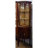 Reproduction mahogany bow fronted glaze top full height corner cupboard on splayed supports, 50cm