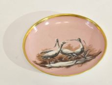 Late 18th century Paris porcelain dish, the salmon pink ground decorated en grisaille with wading