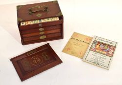 Boxed Mah Jong set in wooden box with brass corners and handles, together with a Mah Jong "Rules