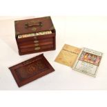 Boxed Mah Jong set in wooden box with brass corners and handles, together with a Mah Jong "Rules