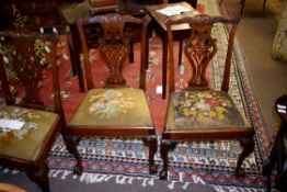 Set of 5 Chippendale style mahogany dining chairs, elaborate pierced splat backs, old tapestry