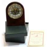 Small table clock with picturesque dial in leather frame with certificate "Made by Roger Lascelles",