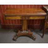 Early 19th century mahogany fold top tea table raised on a quadruped base with scroll feet, 92cm