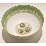 Copeland Spode bowl, the interior with photographs of the Chamberlain family within a green and gilt